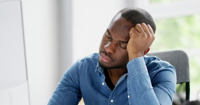 Tired Young Businessman Sleeping