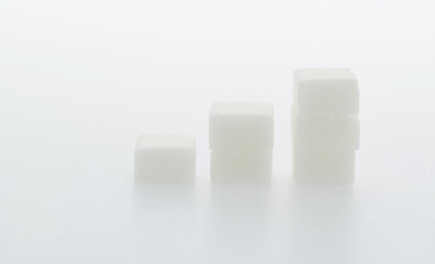 Sugar cubes chart on white background