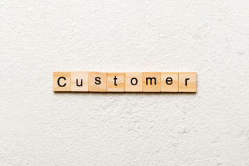 customer word written on wood block. customer text on table, concept