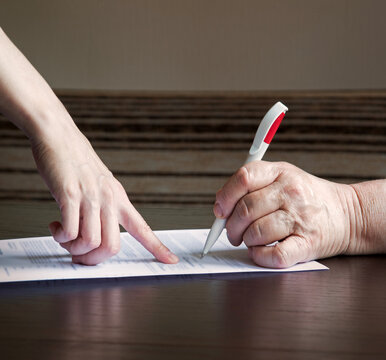 An old woman is forced to write a will for an apartment