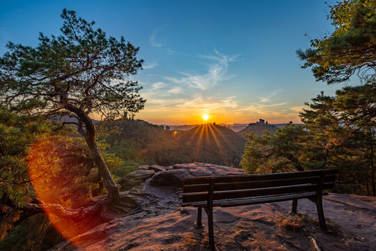 Bench on Rock Slevogtfelsen with View of Trifels Castle during Sunset, Rhineland-Palatinate, Germany, Europe