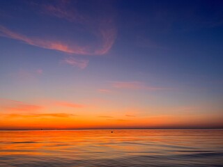 Seascape after the sunset, orange sunset sea horizon, twilights sea view background