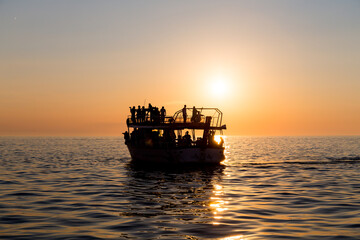 Ferry boat silhouette with passengers