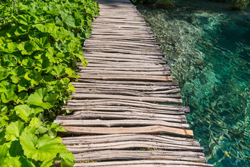 Fototapeta premium Wooden path and lake