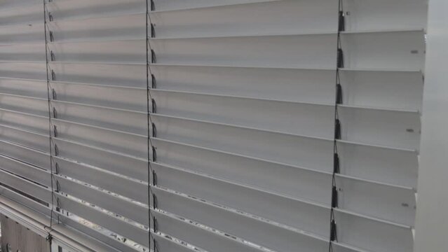 Large roller shutters with electric lift