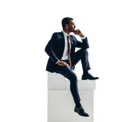 Successful businessman sitting on top of a block of stairs on a transparent background
