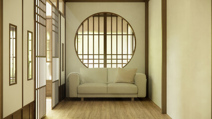 Minimalist japandi style living room decorated with sofa.