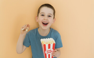 Caucasian boy with popcorn copy space