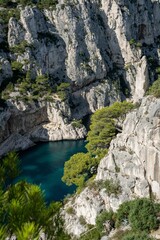 Fototapeta na wymiar Aerial view of pond surrounded by cliffs