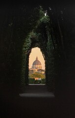 Beautiful view of the St. Peter's Basilica in Vatican City, through keyhole on the Aventine