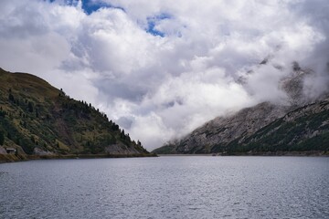 Beautiful landscape of a lake in Dolomites on a cloudy day