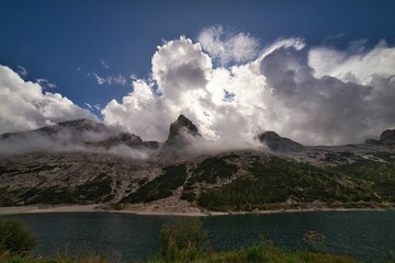 Beautiful landscape of a lake in Dolomites on a cloudy day