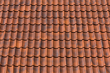 Red tiles roof background
