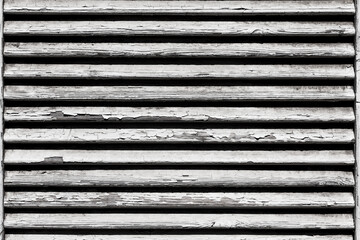 wooden shutters, covering a window or door