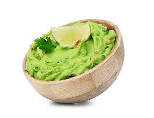 Bowl of delicious guacamole with lime isolated on white