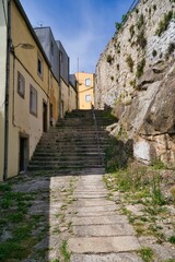 Fototapeta na wymiar Vertical shot of a narrow pathway in Porto (Oporto), Portugal