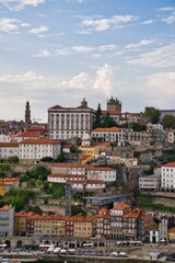 Naklejka na ściany i meble Vertical shot of modern buildings in Oporto, Portugal