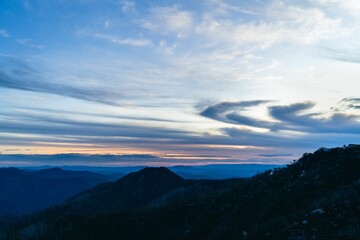 Beautiful view of colorful sunset sky over the high mountains