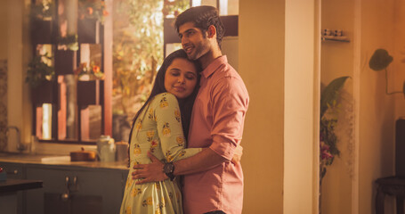 Young Couple Dancing in the Kitchen with Calm Passion. Moment of Love and Intimacy, Girfriend Tenderly Puts Her Head on Mans Chest where his loving heart beats. Happiest people in the world