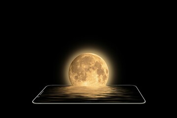 Yellow full moon in  water on the tablet screen isolated on black background