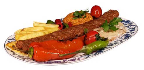 isolated turkish flavor adana, urfa kebab served with onion, tomato, pepper and bulgur pilaf on a plate