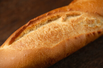 Fresh crispy French baguette, close up