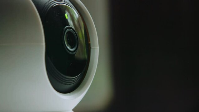 Rotating Home Security Camera Observing Area Inside House