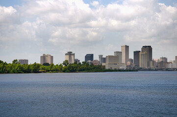 Fototapeta na wymiar New Orleans skyline from Mississippi river.