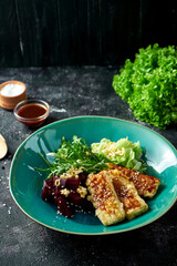 Salad with fried tofu and beets in a bowl. Superfood