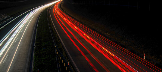 lights of cars driving at night. long exposure