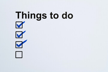 Fototapeta premium Blue pen marking on to do list