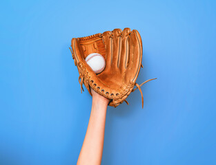 Leather baseball glove caught a baseball for the game