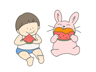スイカを食べる男の子とウサギ