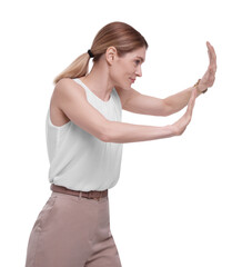 Beautiful businesswoman avoiding something on white background
