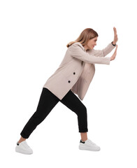Beautiful businesswoman pushing something on white background