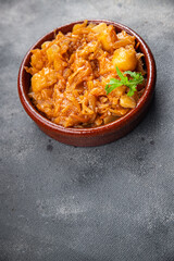 stewed cabbage with vegetables healthy meal food snack on the table copy space food background rustic top view keto or paleo diet veggie vegan or vegetarian food no meat