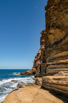 Vertical shot of rock formations on the coast of Korbous in Tunisia