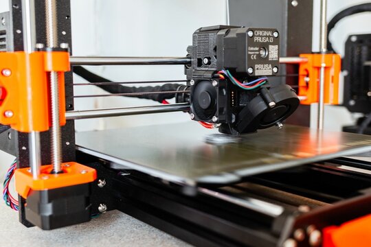 Closeup of 3D printer photographed while printing
