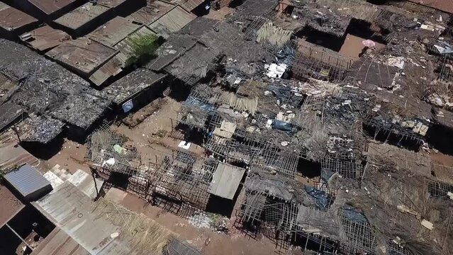 Aerial view of tin roofs near outdoor market in Nampula, Mozambique.