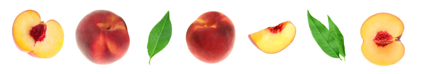 Fresh peaches and green leaves on white background