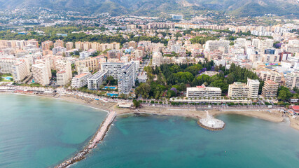 Fototapeta premium Fuengirola Spain, Aerial view on Coast of sea and buildings. Drone photo of coastal town