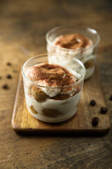 Traditional homemade tiramisu served in glasses