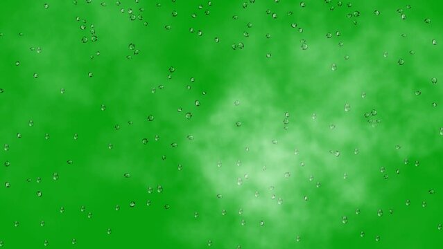 3d rendered animation of droplets of water on a green screen background