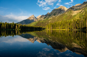 Teton Mountains Reflect in Calm Waters of String Lake