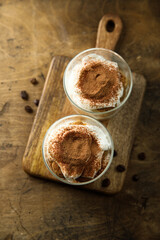 Traditional homemade tiramisu served in glasses