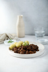 Homemade beef ragout with potato dumplings