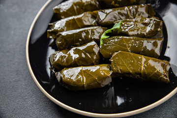 dolma grapes leaves meat stuffing healthy meal food snack on the table copy space food background rustic top view