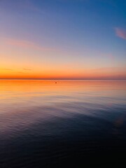 Obraz premium Beautiful orange sunset at the sea, sunset sea horizon, golden hour