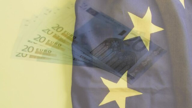 Animation of euro bills falling over eu flag on grey surface