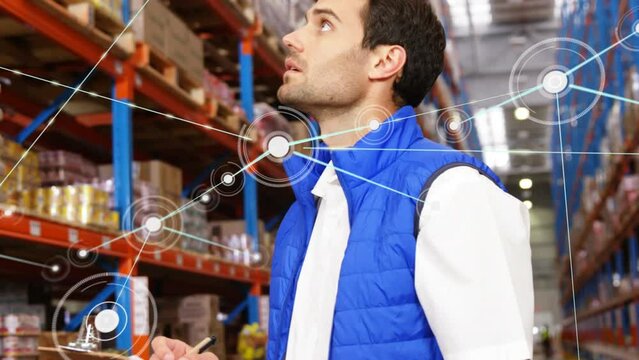 Animation of network of connections with icons over caucasian male worker in warehouse
